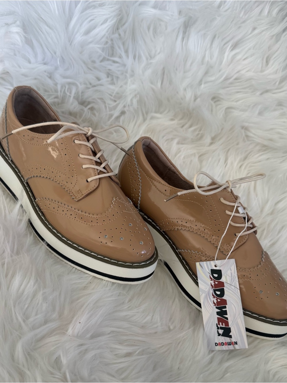 Women’s or unisex Patent Leather Wingtip Oxfords in Beige